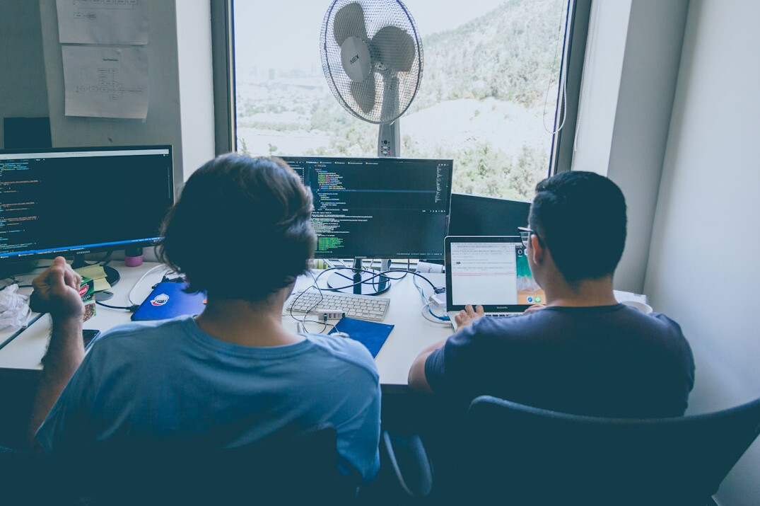 team of programmers collaborating