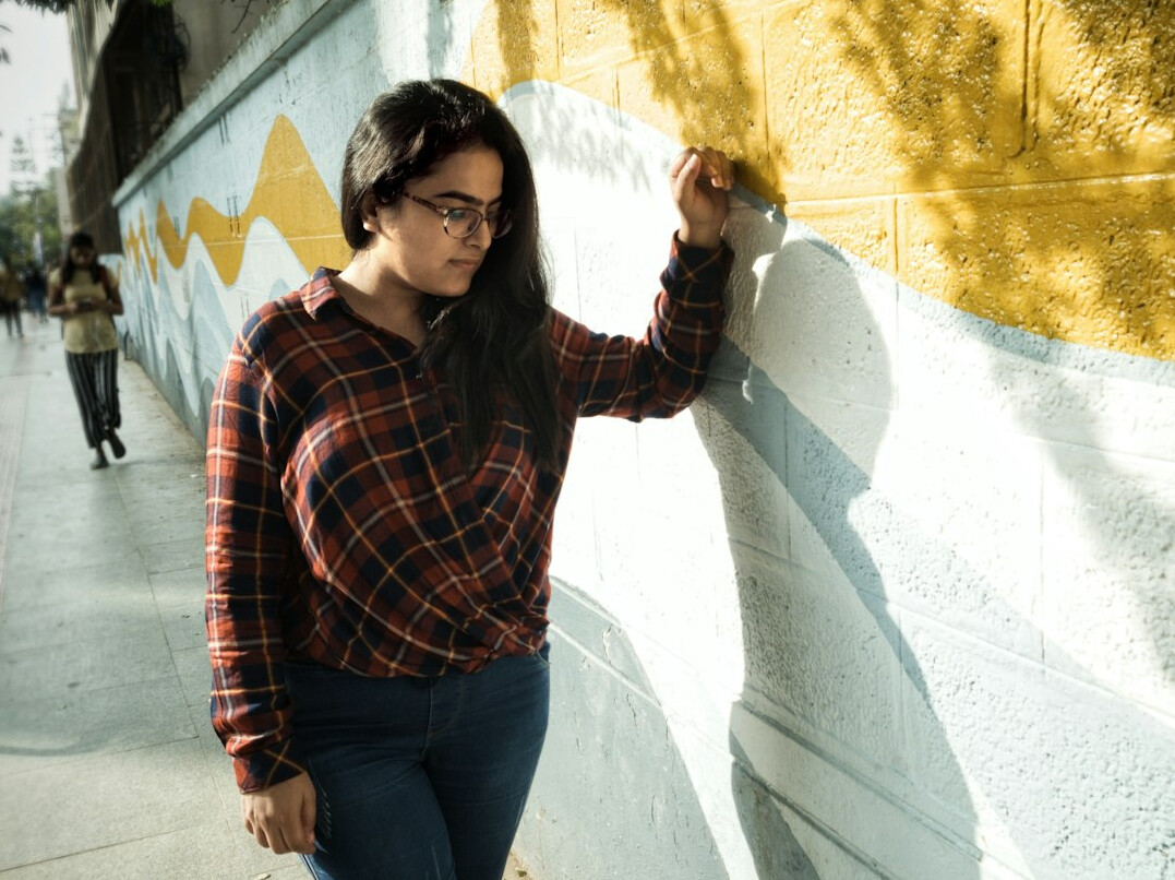 Studio portrait of a Croatian female UX researcher with short dark hair