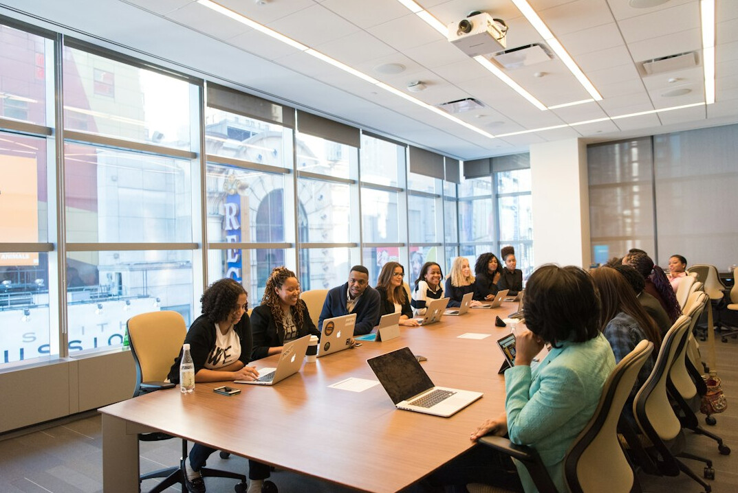 insurance software team meeting